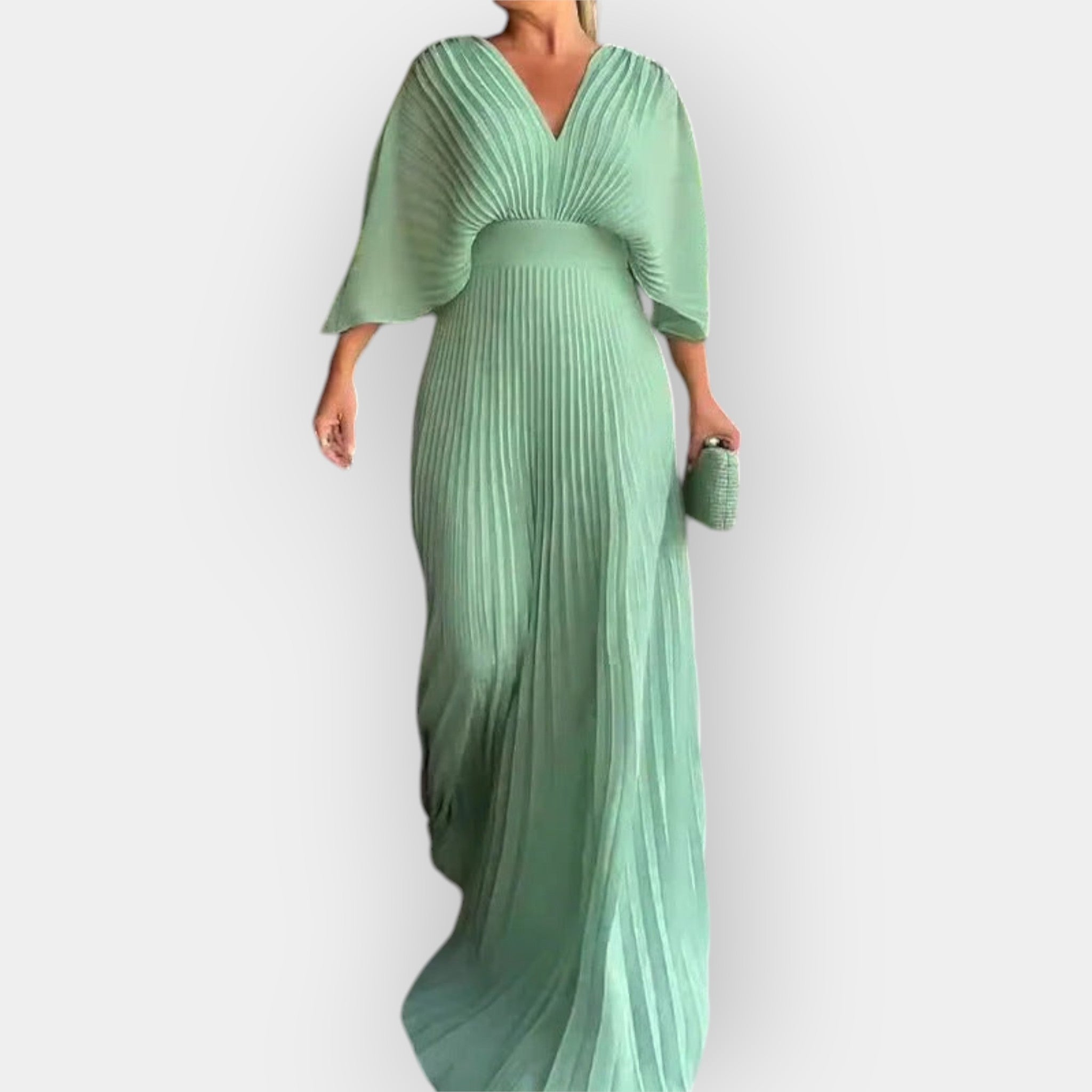 Elegantse joonega volditud kleit
