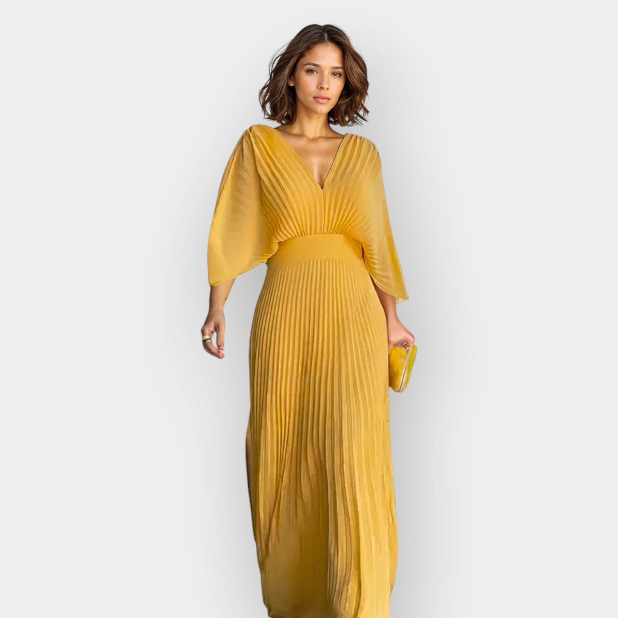 Elegantse joonega volditud kleit