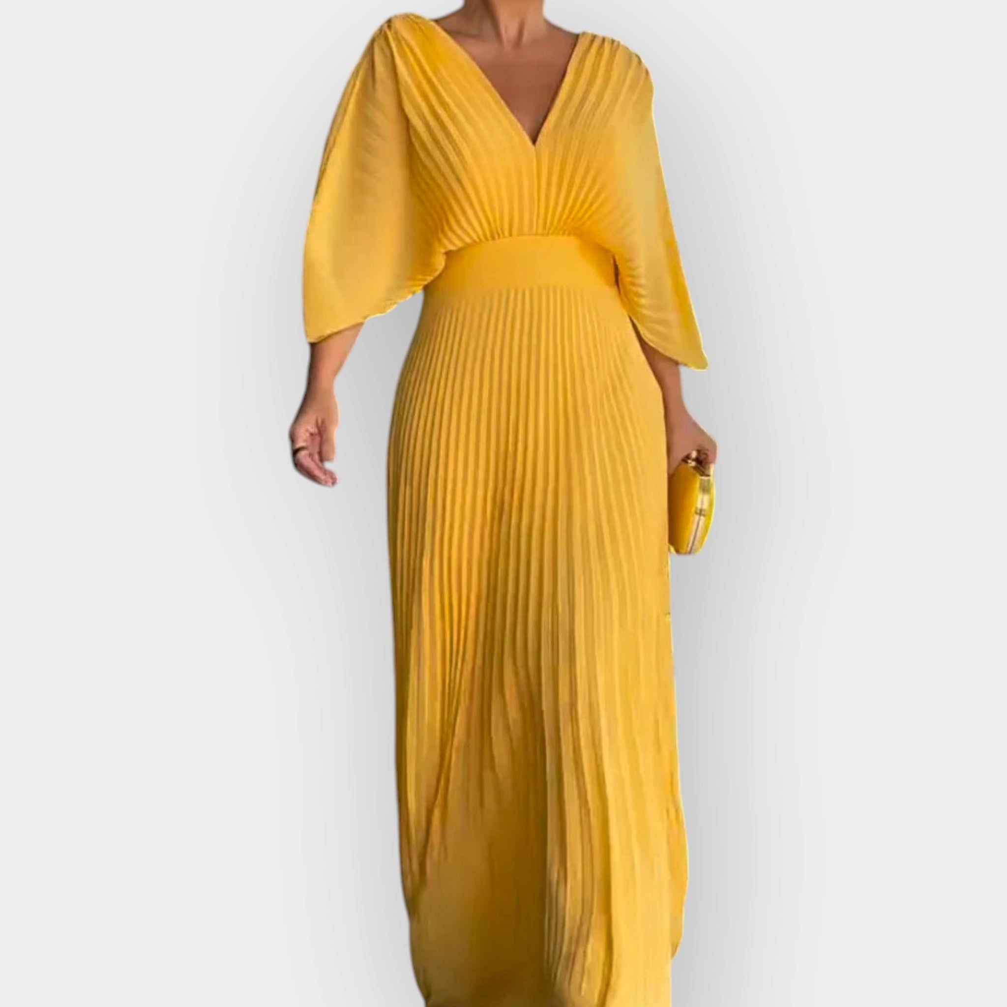 Elegantse joonega volditud kleit